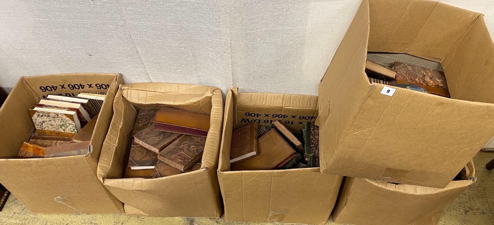 A quantity of assorted leather bindings
